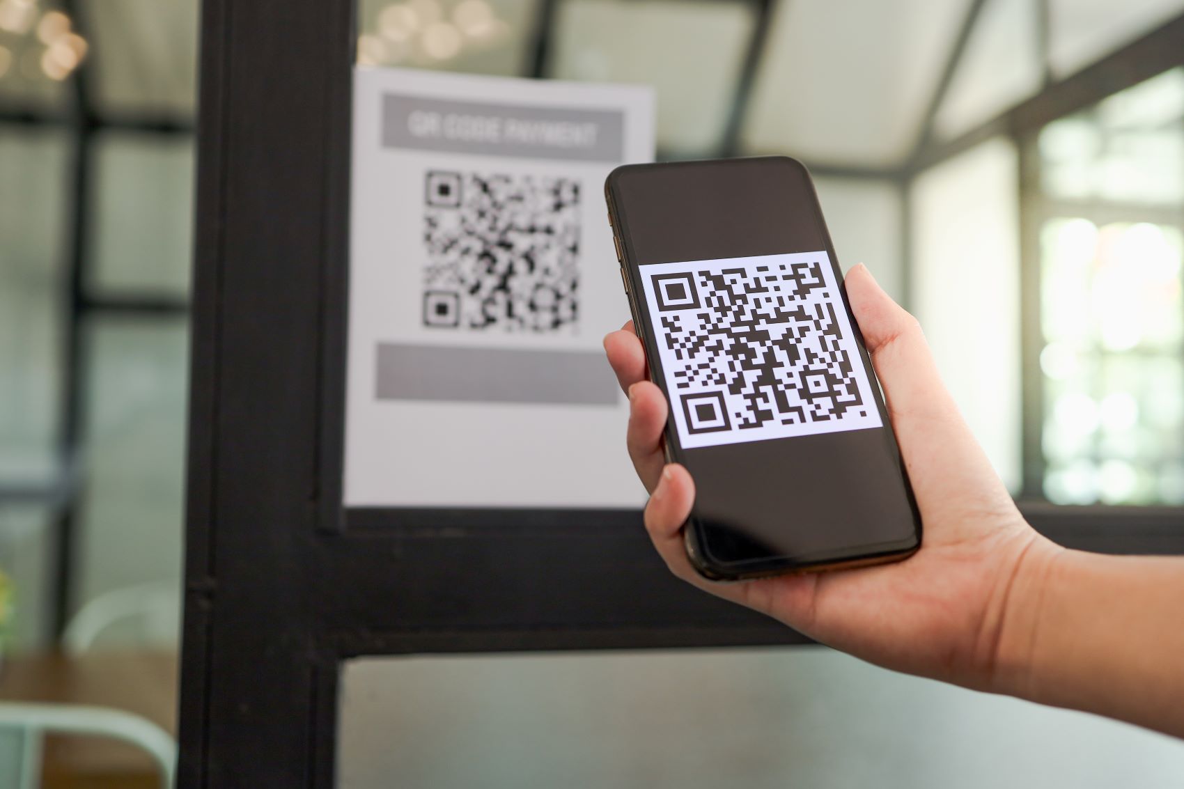person using a QR code 